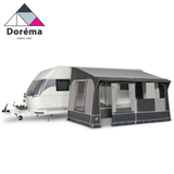 Dorema Quartz 400 Deluxe porch awning, featuring a spacious design and durable fabric, set up outside a camper.