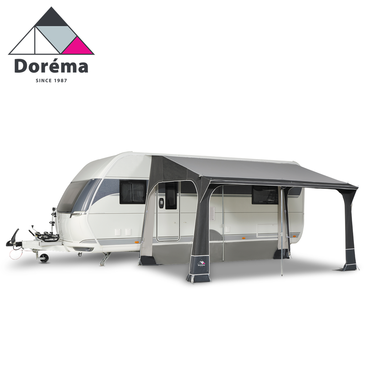Dorema Quartz 400 Deluxe Porch Awning showcasing a spacious design with a sturdy frame and fabric in a natural setting.