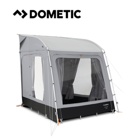 Dometic Rally Tour poled awning set up with adjustable poles and a spacious canopy in a scenic outdoor setting.