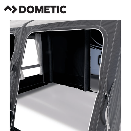 Dometic Rally Air Stay 260s Awning set up outside a camper, showcasing the durable fabric and airframe structure.