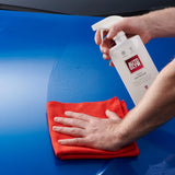 Autoglym Rapid Detailer bottle on a clean surface, showcasing its sleek design for effective vehicle cleaning.