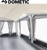 Dometic Residence Air Tour Awning set up, showcasing its spacious canopy and air-filled structure in a sunny outdoor setting.