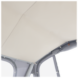 Dometic Pop Air Tour air awning shown on a camper roof, featuring a compact design and durable fabric for outdoor use.