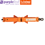 Purpleline caravan scissor jack with a sturdy design, shown in use on a gravel surface for vehicle leveling.
