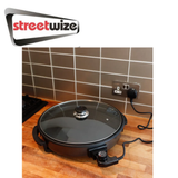 Streetwize electric skillet with a non-stick cooking surface and adjustable temperature control, ideal for versatile cooking.