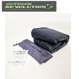 Outdoor Revolution Campese Thermo Arm Chair with padded seat and armrests, set against a natural outdoor backdrop.