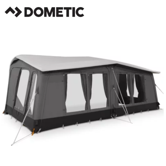 Dometic Residence Air Stay awning extended outside a camper van, providing shaded outdoor space with easy-to-setup design.
