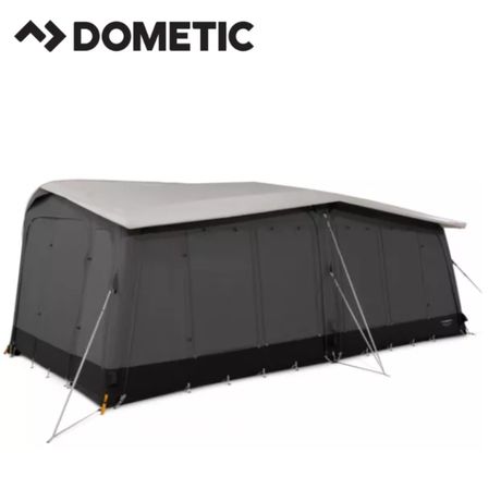 Dometic Residence Air Stay awning extended outside a camper van, providing shaded outdoor space with durable fabric and support poles.
