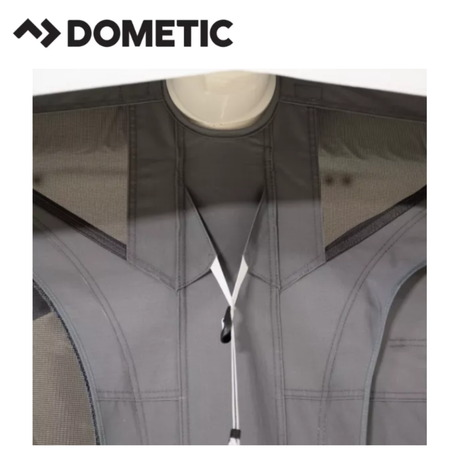Dometic Residence Air Stay awning extended outside a campervan, providing shade and shelter with durable fabric and support poles.