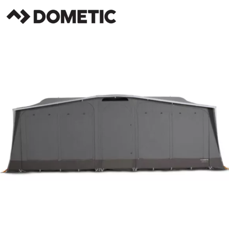 Dometic Stuga Rest Awning extends from a camper, showing its fabric canopy and support poles for outdoor shade and shelter.