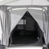 Dometic Tour Air Tall Annexe with inner tent, showcasing its spacious design and durable fabric in an outdoor setting.