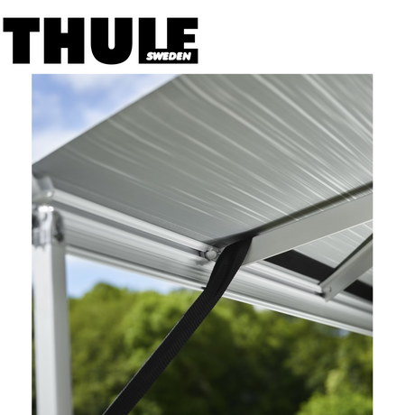 Thule Hold Down Kit 307906 featuring straps and anchors for securing gear during transport.