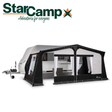Dorema StarCamp Tourer Seasonal Full Awning set up, showcasing its spacious design and durable material in a campsite setting.