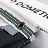 Dometic Sunshine Air Tour air canopy set up in a snowy winter landscape, providing shade and shelter outdoors.